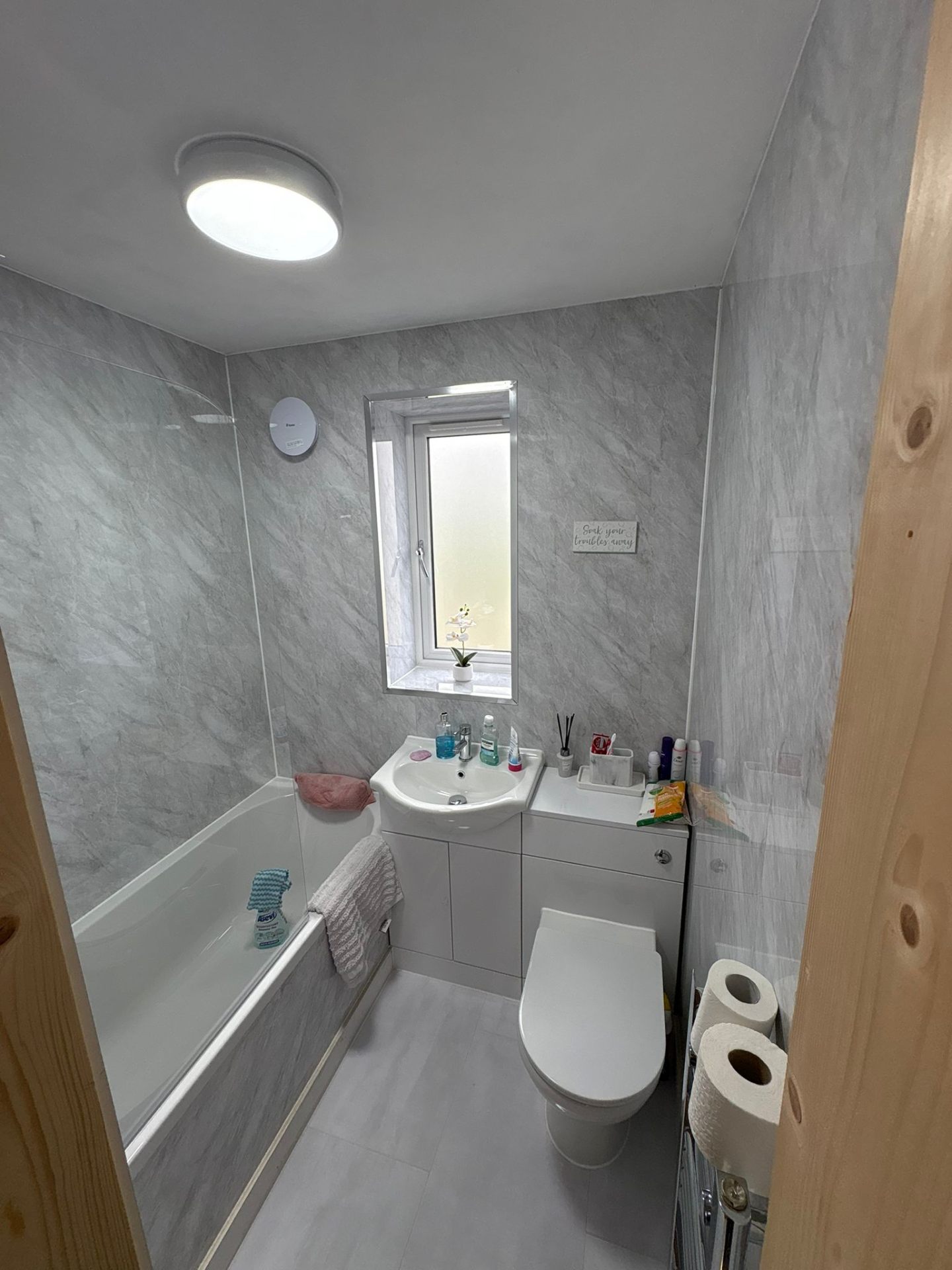 Modern fitted bathroom with walk-in shower installed in Glasgow