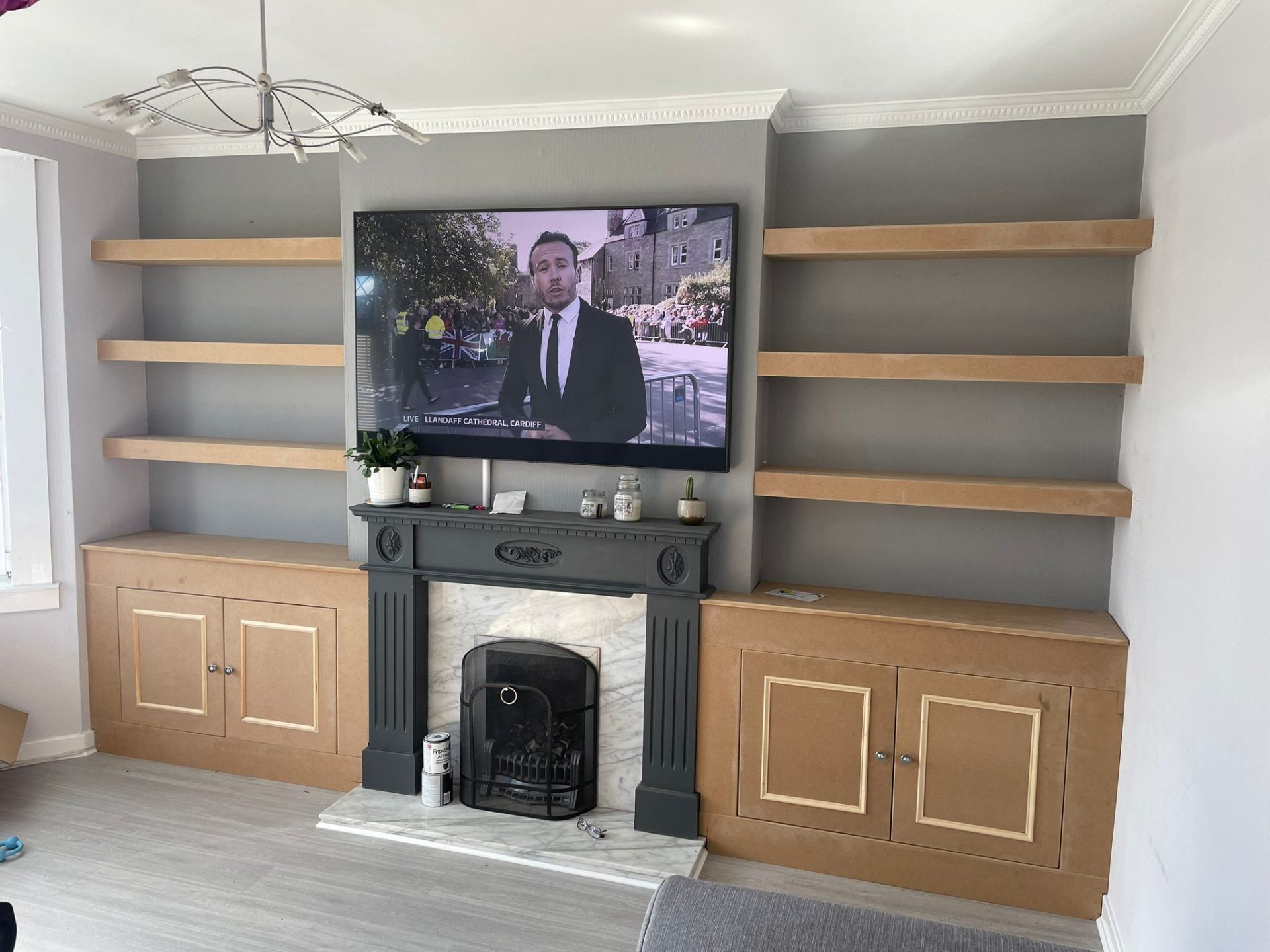 Built-in alcove shelving fitted in a renovated Glasgow living room