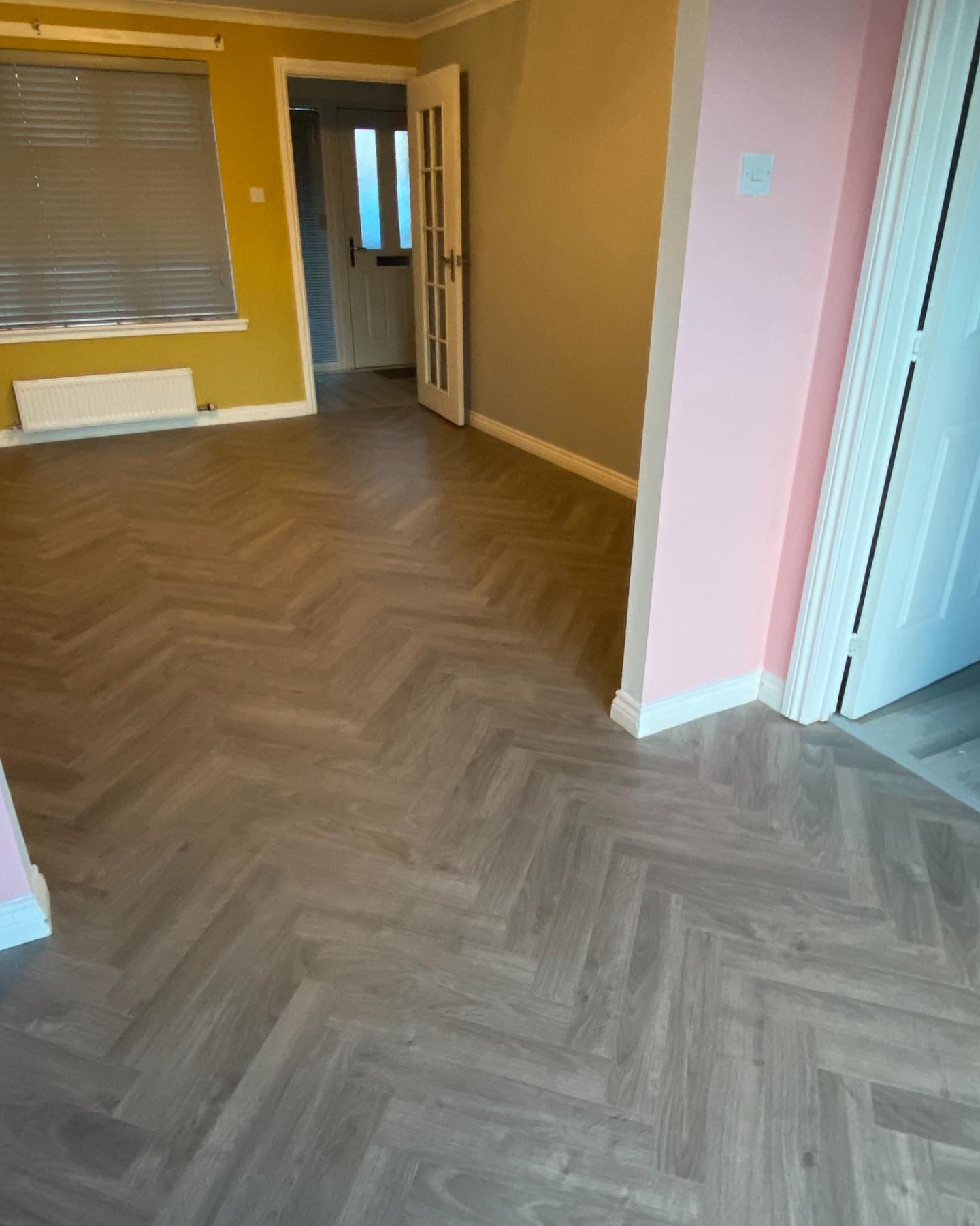 Two-tone LVT flooring installed in a Glasgow home