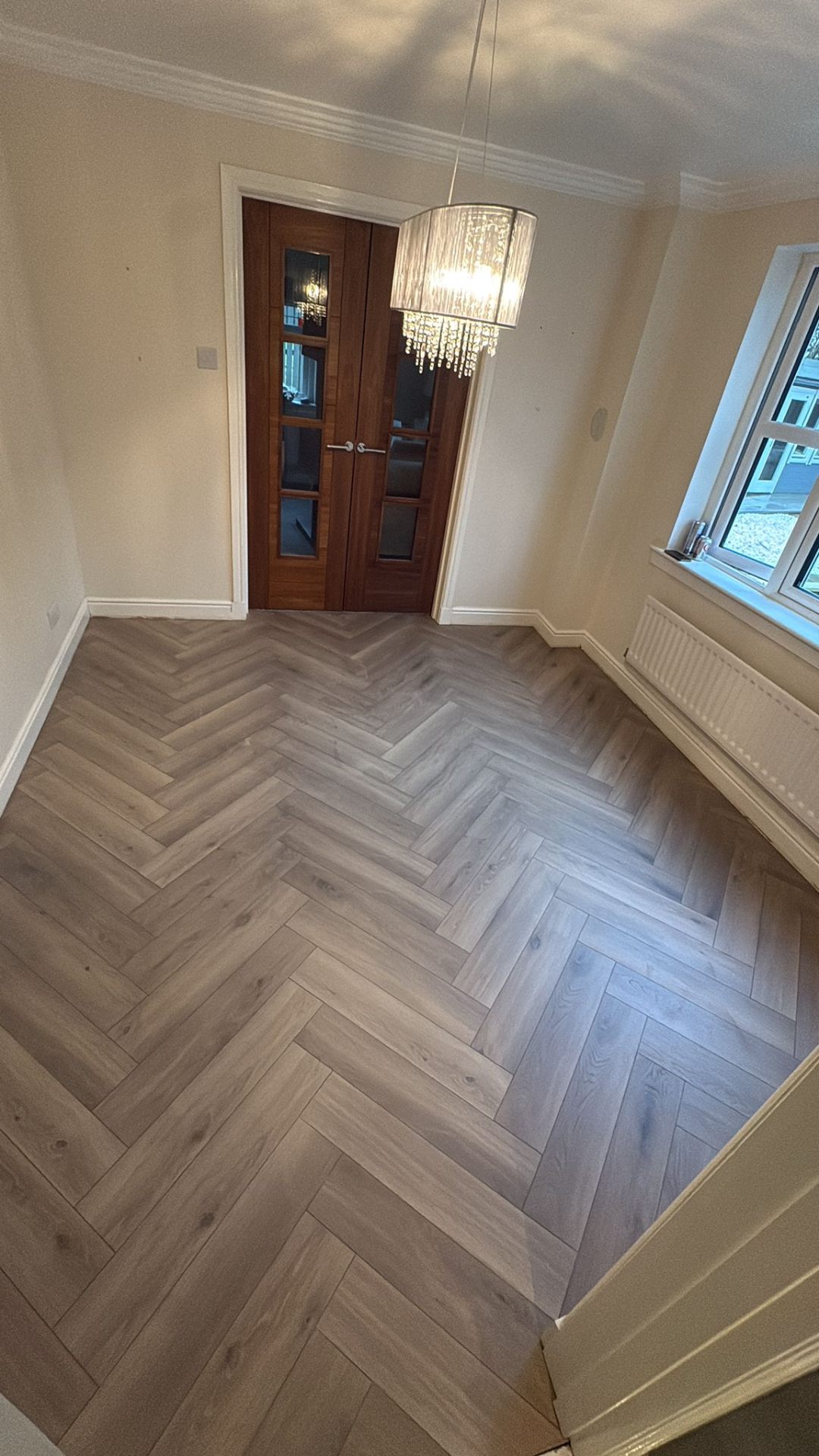 Grey LVT herringbone flooring fitted in Glasgow