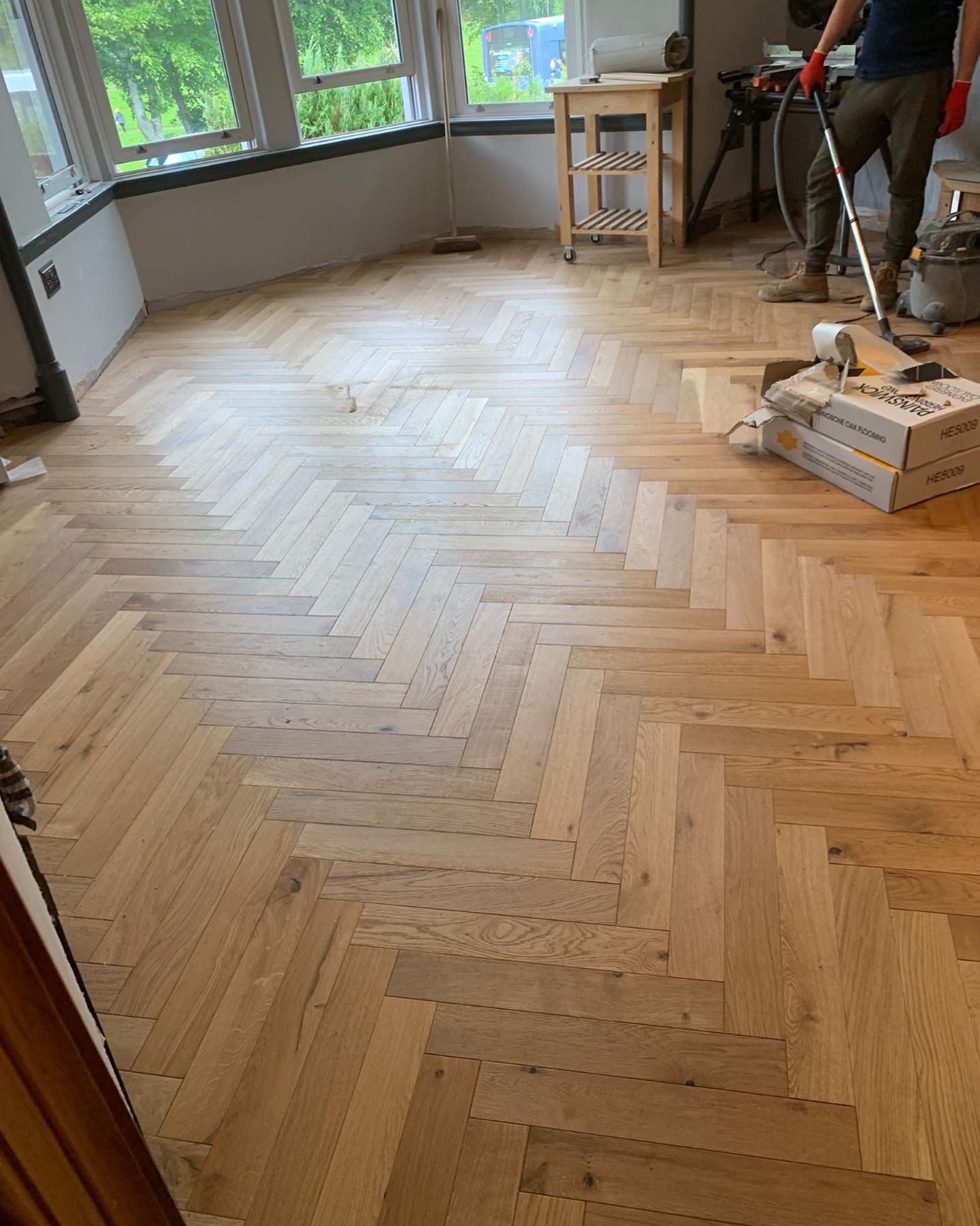 Oak herringbone floor being set out during installation in Glasgow