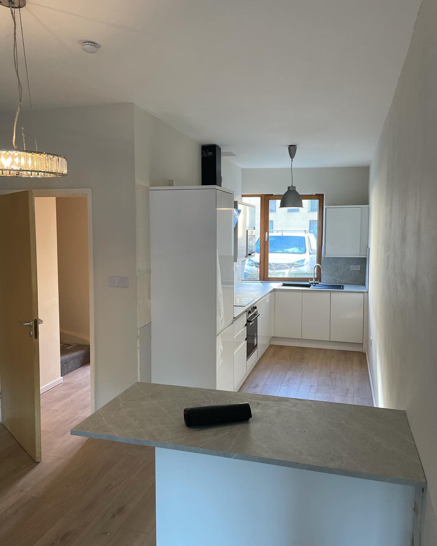White gloss kitchen — full fit completed